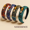 Afrocentric headbands with colorful patterns, cowrie shells, beads, and button accents