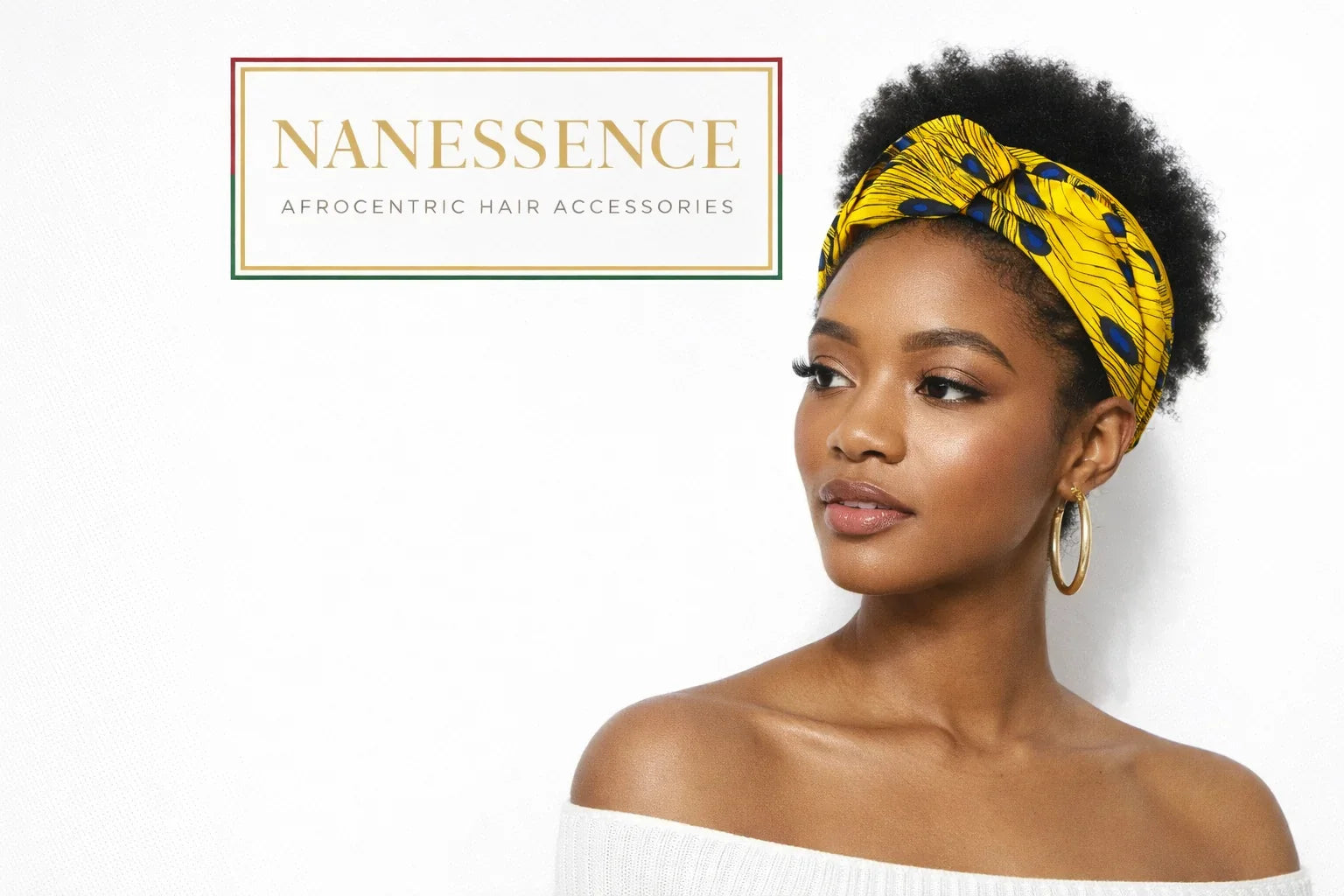 Woman wearing yellow Afrocentric headband with blue pattern, hoop earrings, off-shoulder top