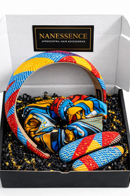 Colorful Afrocentric headband, scrunchie, and hair clips with vibrant geometric patterns in a gift box.