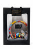 Gift bag with colorful Afrocentric headband and patterned hair accessory inside transparent window