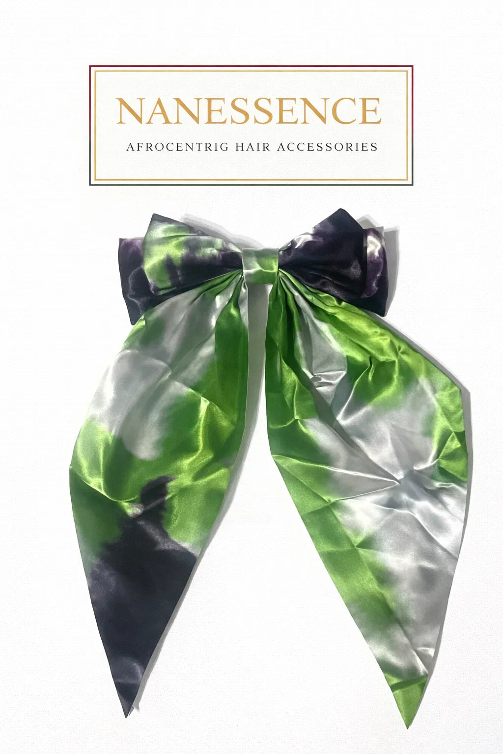 Green and black satin Afrocentric hair bow accessory on white background