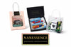 Gift sets of Afrocentric hair accessories in colorful packaging with bold patterns and box.