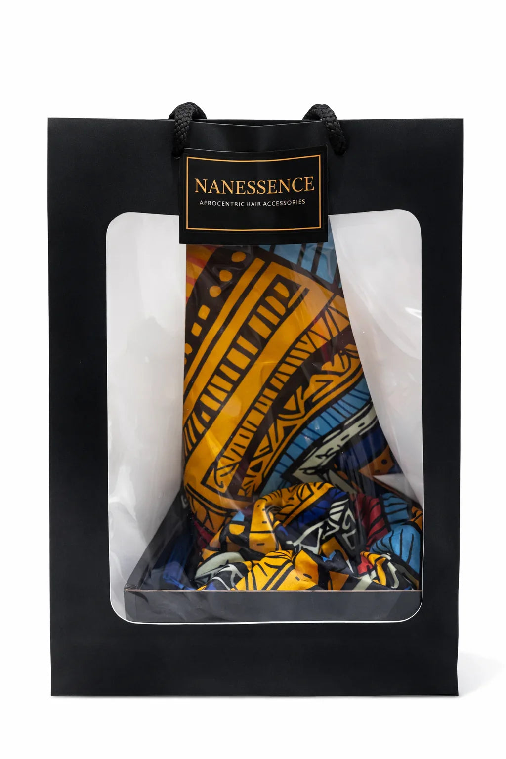Gift bag with vibrant Afrocentric patterned fabric in orange, blue, and black colors