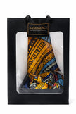 Gift bag with vibrant Afrocentric patterned fabric in orange, blue, and black colors