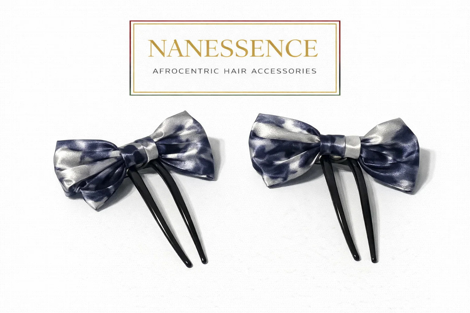 Pair of Afrocentric bow hair forks, blue and silver pattern, on white background