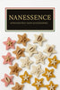 Afrocentric star-shaped hair accessories with bead and cowrie shell accents, assorted colors