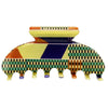 Afrocentric patterned hair claw clip with geometric design in yellow, green, orange, and blue