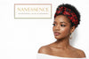 Woman with natural hair wearing red and black Afrocentric headband and hoop earrings