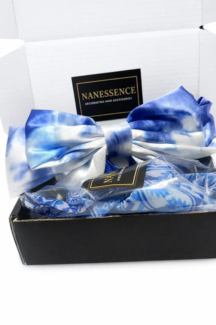 Blue and white satin bow hair accessories in a gift box, Afrocentric print