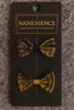 Afrocentric bow hair accessories set with bold tribal patterns in brown and gold on display card