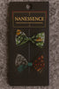 Two Afrocentric fabric hair bows with vibrant patterns on display card, hair accessories