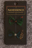 Afrocentric hair accessories set with two colorful patterned fabric bows on display card