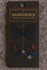 Afrocentric hair bows with bold blue and red patterns on display card