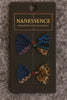 Afrocentric polka dot fabric hair bows in blue, purple, gold, and brown on retail card