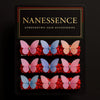 Set of colorful butterfly Afrocentric hair clips with red beads on decorative packaging