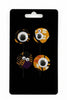 Set of four Afrocentric fabric brooches with googly eyes on a black display card