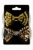 Set of two Afrocentric bow hair clips with geometric gold and brown patterns on black backing