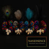 Colorful Afrocentric hair scrunchies with feathers and cowrie shells on black background.