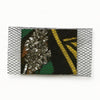 Handcrafted Afrocentric clutch with metallic stones, bold geometric patterns, and mesh overlay