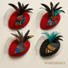 Afrocentric mini hats with colorful Ankara patterns, feathers, and netting accents