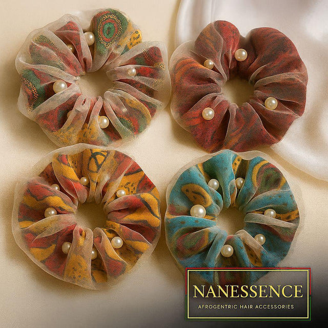 Set of four colorful Afrocentric hair scrunchies with mesh and pearl accents on satin fabric